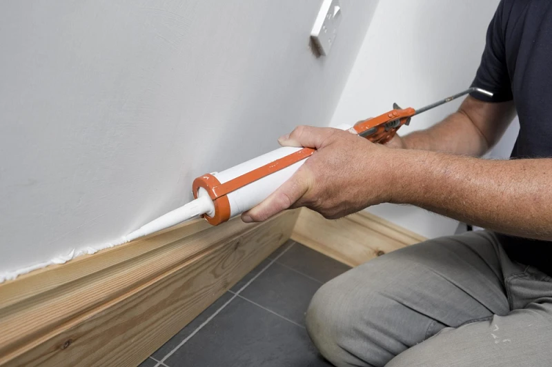 wood baseboards Caulk Gaps wood baseboards Caulk Gaps